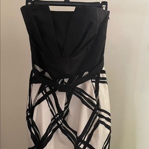 Strapless dress with beautiful details. Great condition and worn only once.